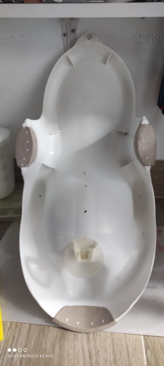 Adaptador/posicionador bebé baño