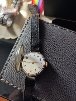 Orologio per mancini trench