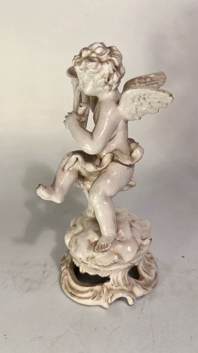 Statua di Bassano di angioletto e corno