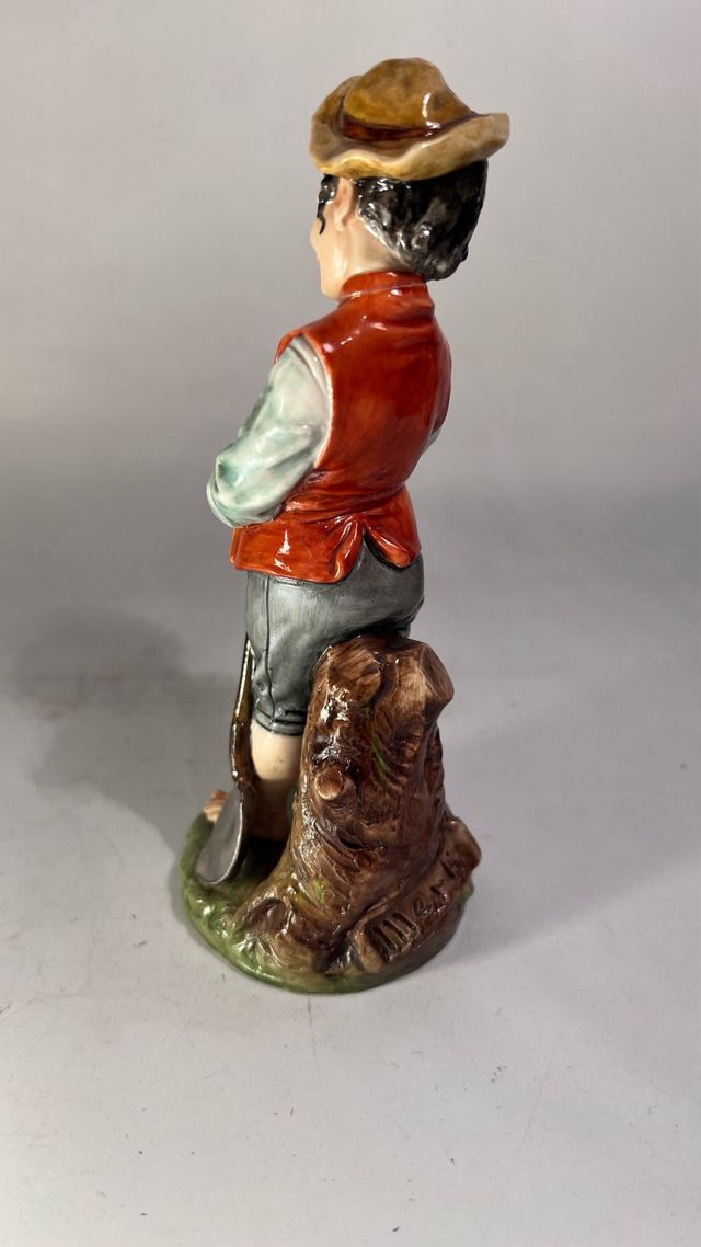 Statuetta di Capodimonte di bambino scalzo, Merli