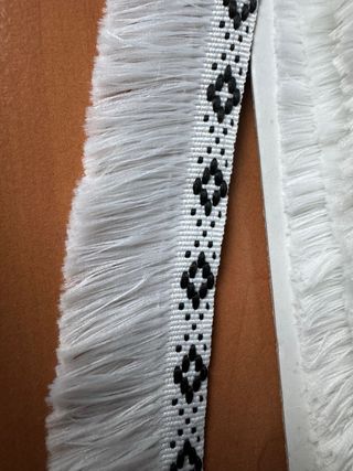 Lote de 71,45 metros de pasamaneria