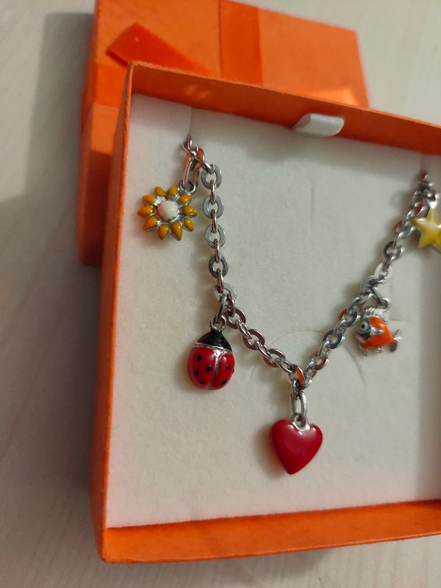 Braccialetto acciaio con ciondoli