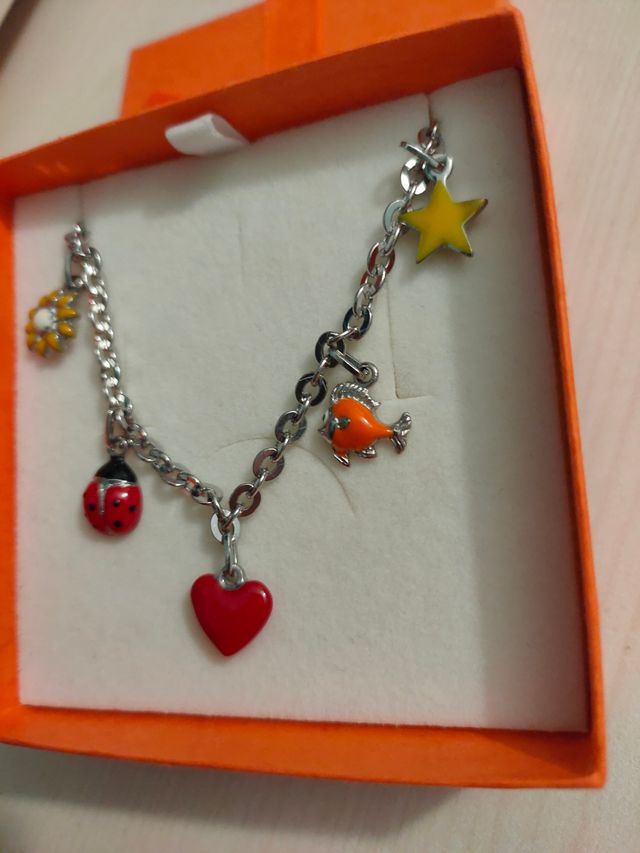 Braccialetto acciaio con ciondoli