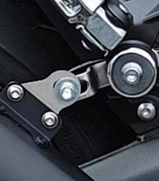 Soporte escape para moto