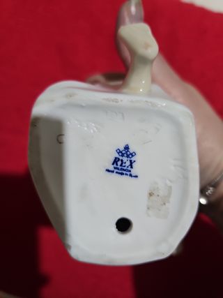 Figura de porcelana de REX