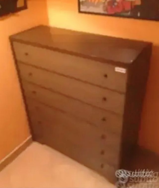 Letto con mobiletto a scomparsa