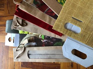 Lotto di buste e confezioni regalo per bottiglie