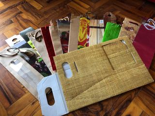 Lotto di buste e confezioni regalo per bottiglie