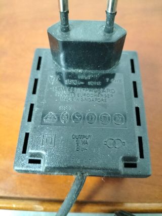 Cargador calculadora HP