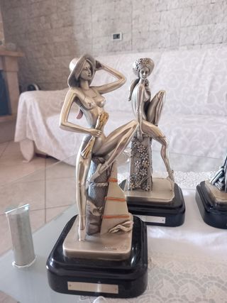 4 statuette in argento