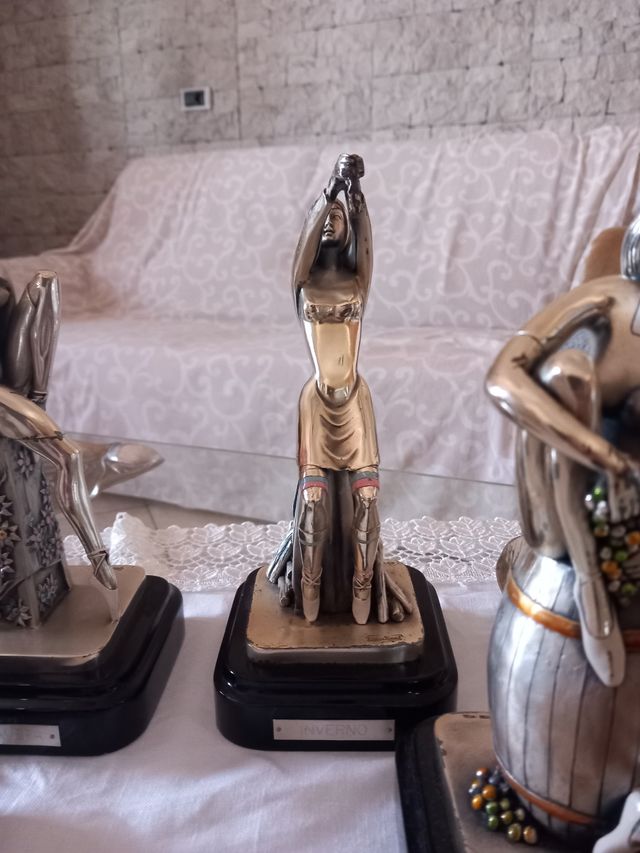 4 statuette in argento