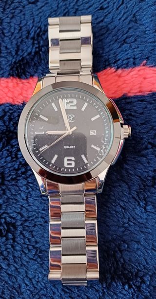 Reloj hombre. 