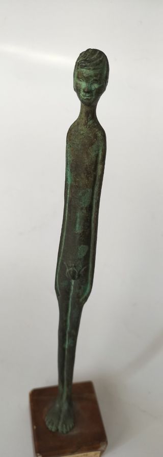 Figura etrusca bronce