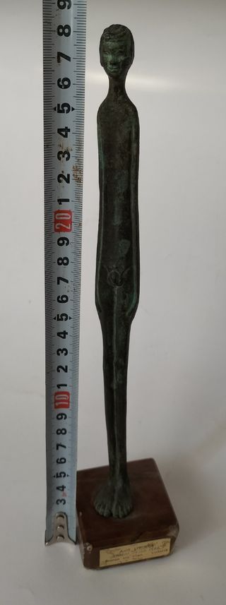 Figura etrusca bronce