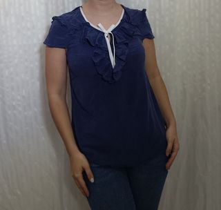 Blusa escote volante