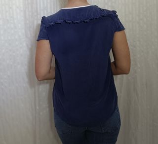 Blusa escote volante