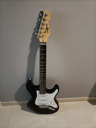 Guitarra eléctrica con amplificador 