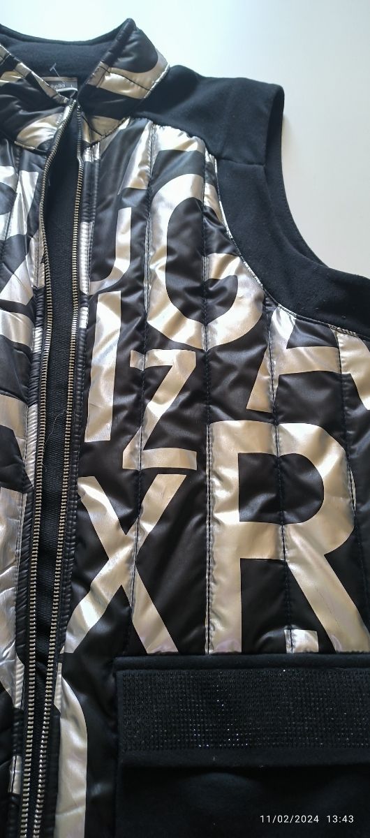 Chaleco talla L, 50 centímetros de axila a axila