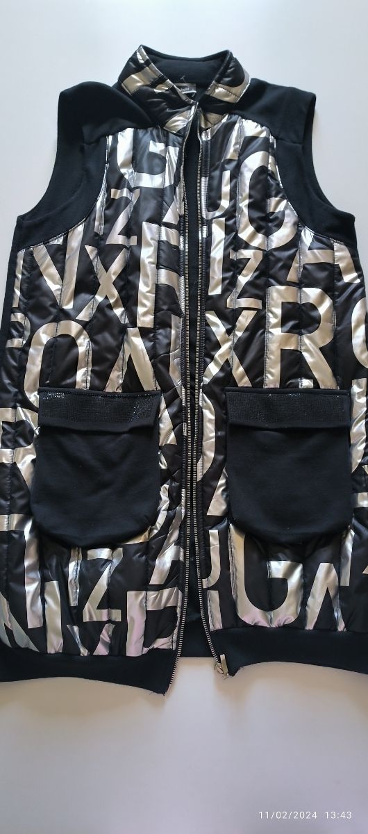 Chaleco talla L, 50 centímetros de axila a axila