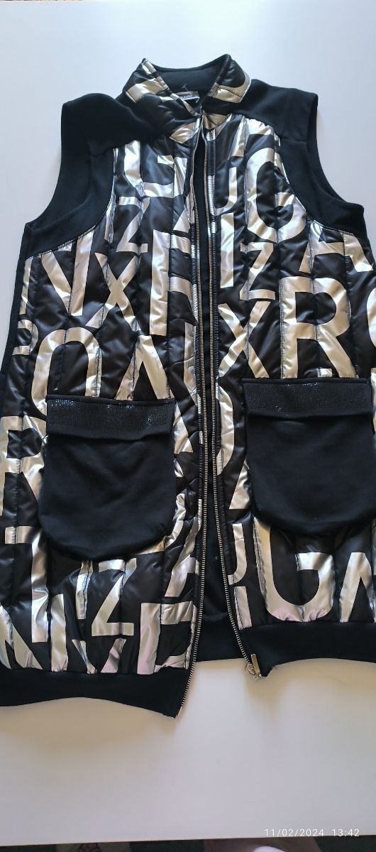 Chaleco talla L, 50 centímetros de axila a axila