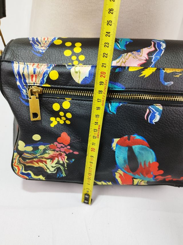 Bolso de mano desigual
