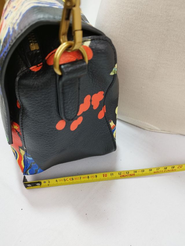 Bolso de mano desigual