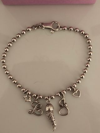 Pulsera de plata con chamrs