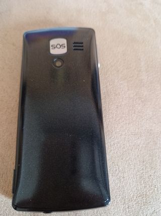 Teléfono Móvil con reloj de ayuda