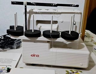 Macchina Taglia Cuci Elna
