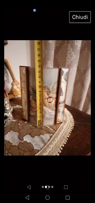 Cornice in argento e legno
