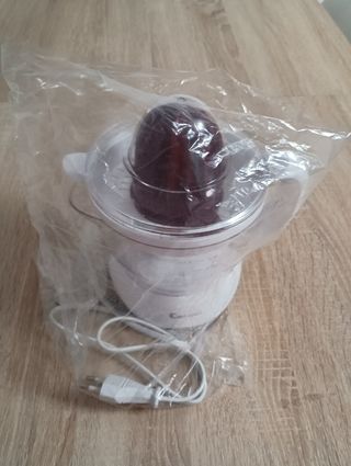 Exprimidor eléctrico comelec