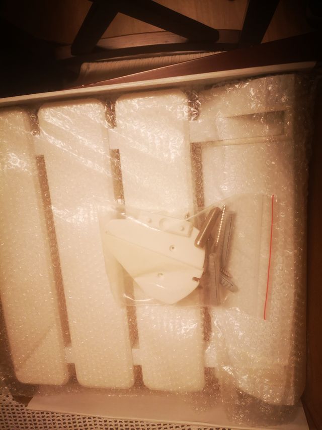 Banqueta plegable de ducha.