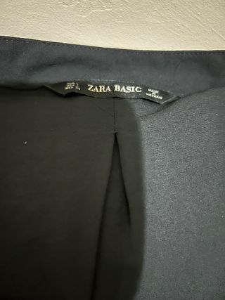 blusa zara con perlas en los puños