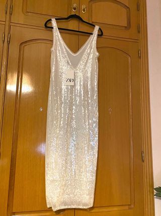 vestido lentejuelas pico