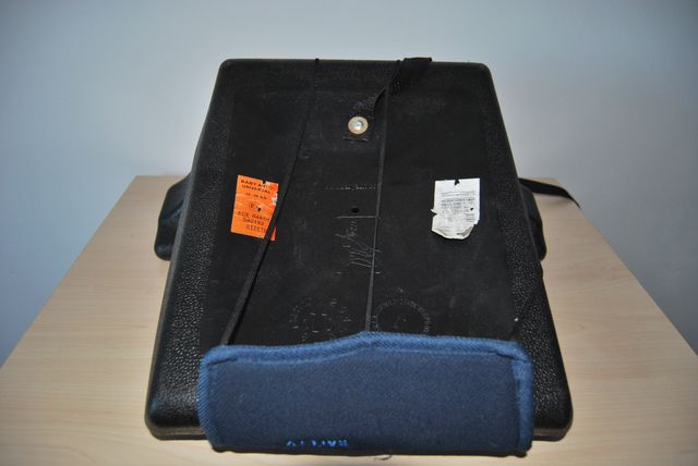 Alzador de coche para niños