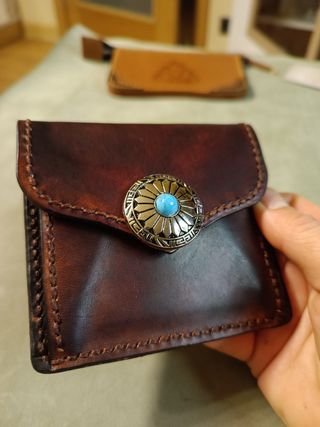Cartera de cuero .