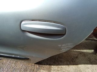 Puerta trasera izquierda tata Indigo 200