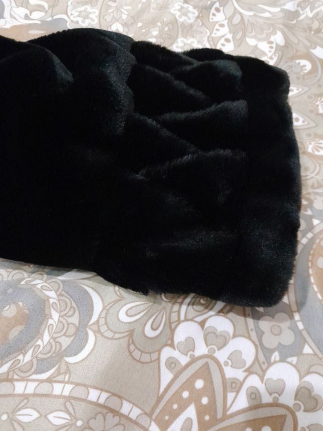 Pellicia sintetica taglia M