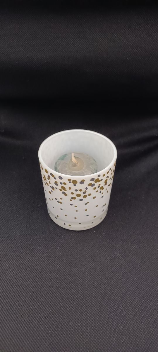 Candela con bicchiere