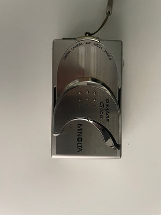 Cámaras Olympus, Minolta Nikon