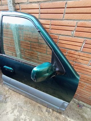Puerta delantera derecha tata safari 2005