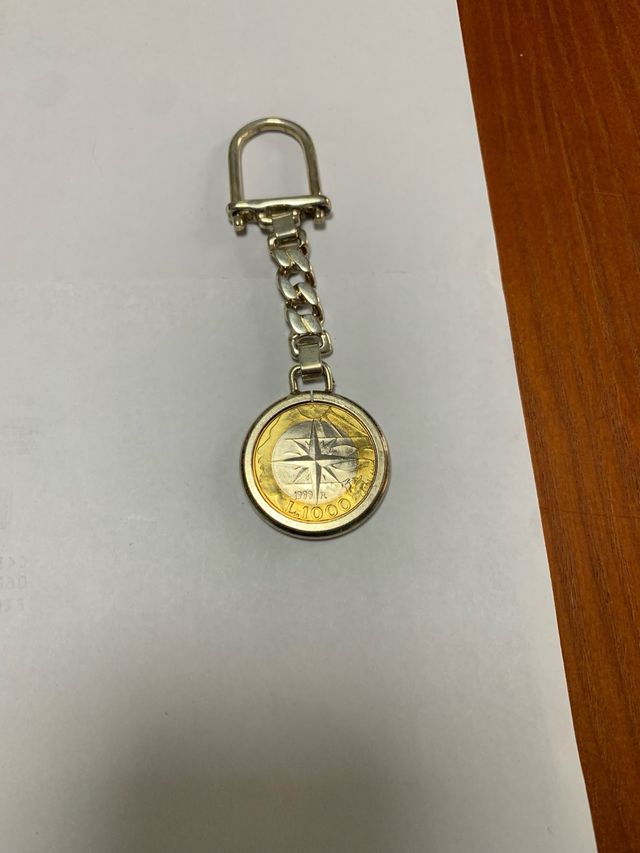portachiavi vintage con moneta da 1000 lire