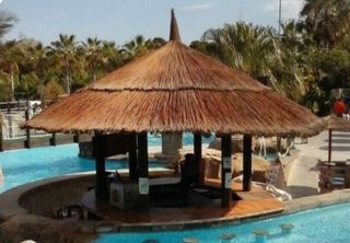 Sombrillas pergolas de brezo mimbre