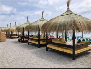 Sombrillas y pergolas de brezo mimbre