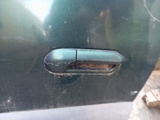 Puerta trasera izquierda tata safari 2005