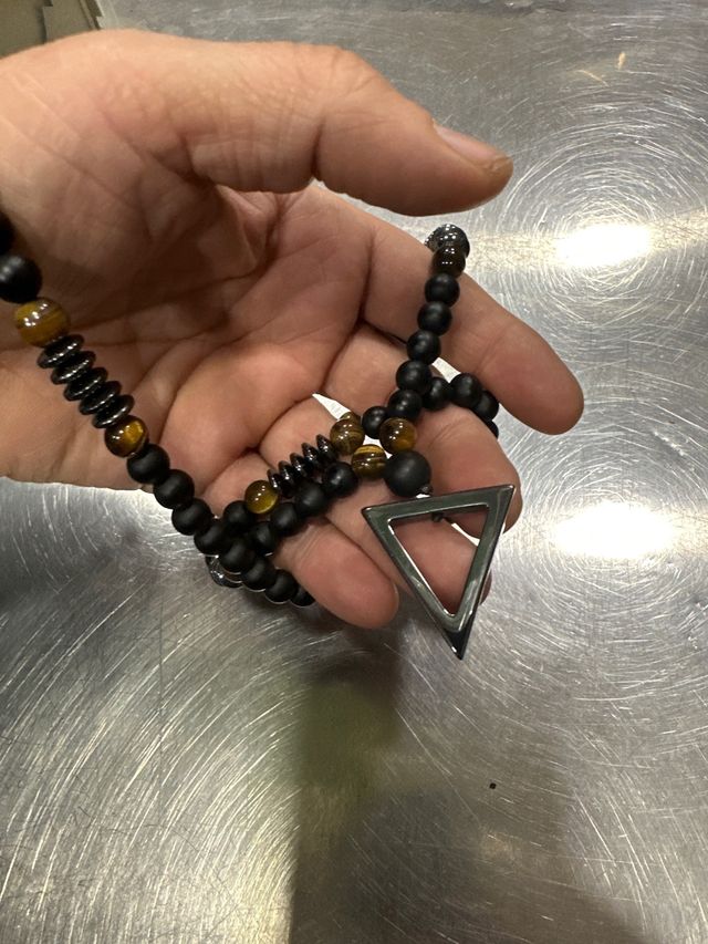 Colgante talisman de proteccion