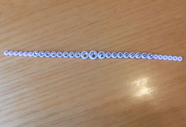 BRACCIALETTO IN SILICONE CON STRASS STROILI