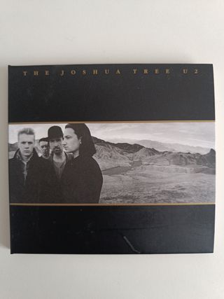 Cd y libro con canciones U2