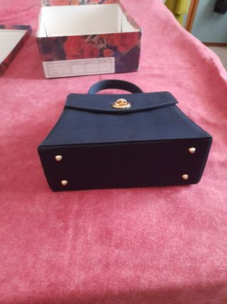 Borsetta blu a mano o a tracolla