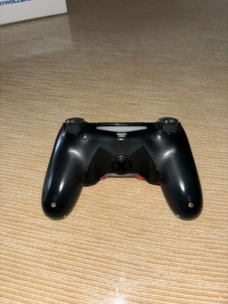 PS4 1 TB + mando pro y juegos